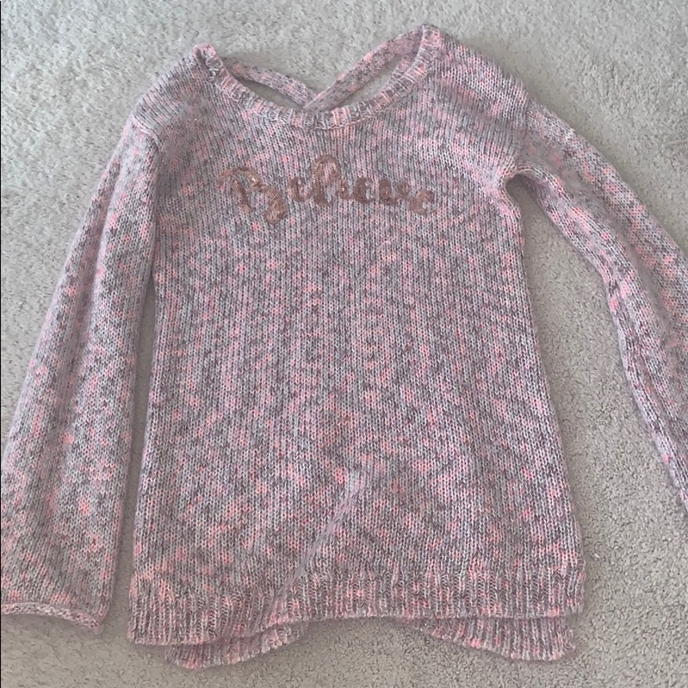 “believe sweater  throw over from Justice!